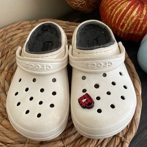 Size 13c white crocs with grey fur and one jibbitz.